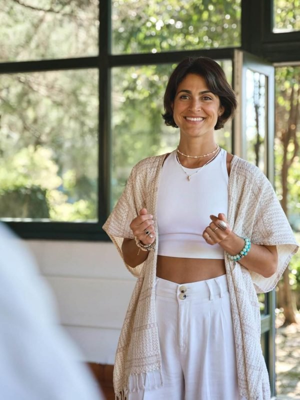 young-happy-woman-yoga-coach-training-people-group-talking-at-holistic-session-.jpg